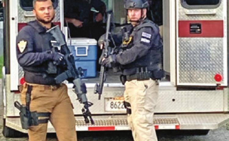 Members of the Cherokee County Sheriff’s Department served search and arrest warrants at four separate residences in Weir Friday morning. Five individuals were arrested and taken to the Cherokee County Law Enforcement Center. Courtesy photo.