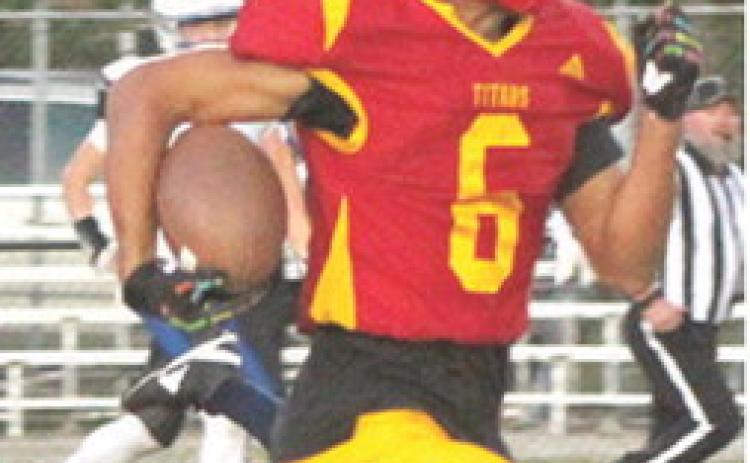Titan Freshman, Jayden Dohle, scored on a 97-yard, kick-off return to score the only touchdown for Columbus in their 7-70 playoff loss to Topeka-Hayden, Friday in Topeka.