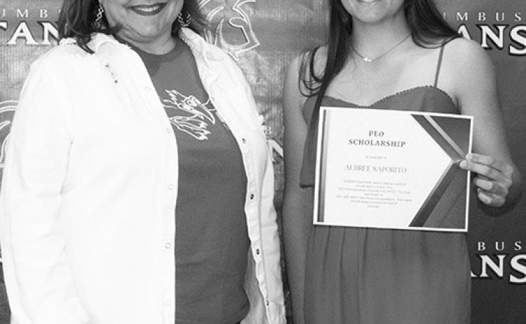 Aubree Saporito was the recipient of the PEO Scholarship in the amount of $500 awarded by Rebecca Stone, during the Senior Assembly at the Columbus Unified High School Gymnasium, May 18.