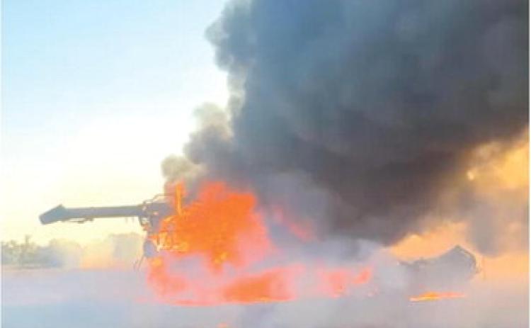 Columbus firefighters responded to a combine fire in a soybean field near Southwest Beasley Road at 5:31 p.m. Saturday. The combine belonged to Westervelt Farms and was a total loss. Courtesy photo.