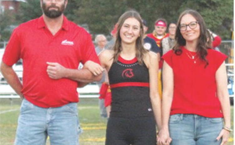 Senior, Darcy Garrett, was recognized during Senior Night Ceremonies, October 17, at Titan Stadium. Darcy is a four-year member of the Titan Band and Titan Cross Country Team. She was escorted by her parents David and Sarah Garrett.
