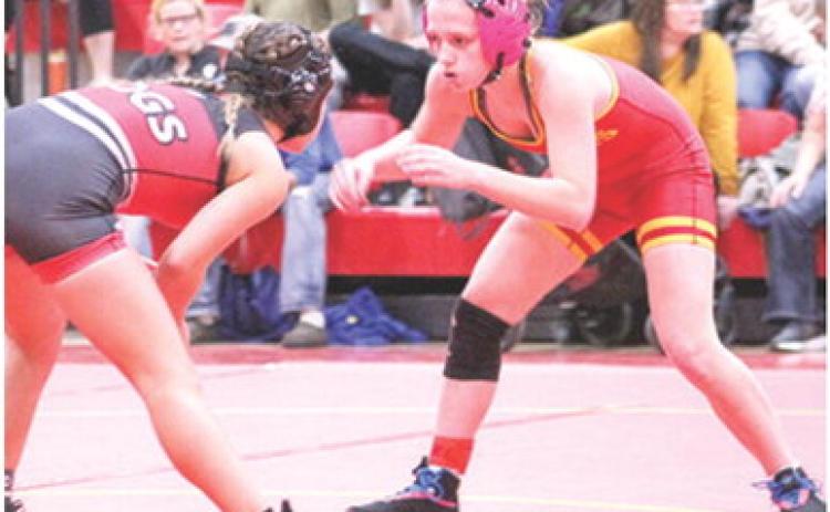 Lady Titan Raelee Engroff earned wins in both her matches, Tuesday, against Parsons and Carl Junction, Mo. she had a win by fall in her match Monday in Columbus wrestling action at the CUHS Gymnasium.