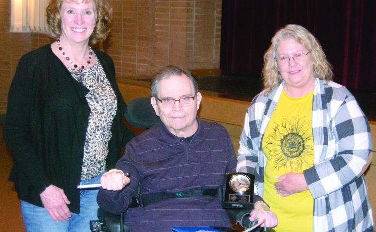 Paul Bone was recognized for his 35 years of service to the Conservation Service at the annual meeting held Monday, February 24 at the Columbus High School Auditorium. The recognition was presented by Wendie Powell County Executive Director of Crawford County and Jodi Cushenbery from Labette County.