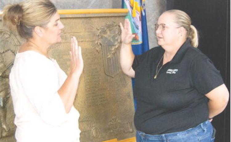 Newly elected Treasurer Heather Sapp was sworn in Monday morning by County Clerk Rebecca Brassart Monday morning after receiving the official appointment by Gov. Laura Kelly was received. She was selected by the Republican Central Committee to serve out the unfinished term of former treasurer Raven Youngblood.