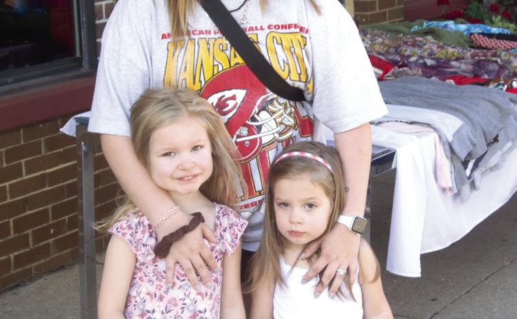 Attending the Columbus High School Homecoming parade were Claudia, Ariana and Gloria Martocei. They were part of the large crowd awaiting the parade to start.