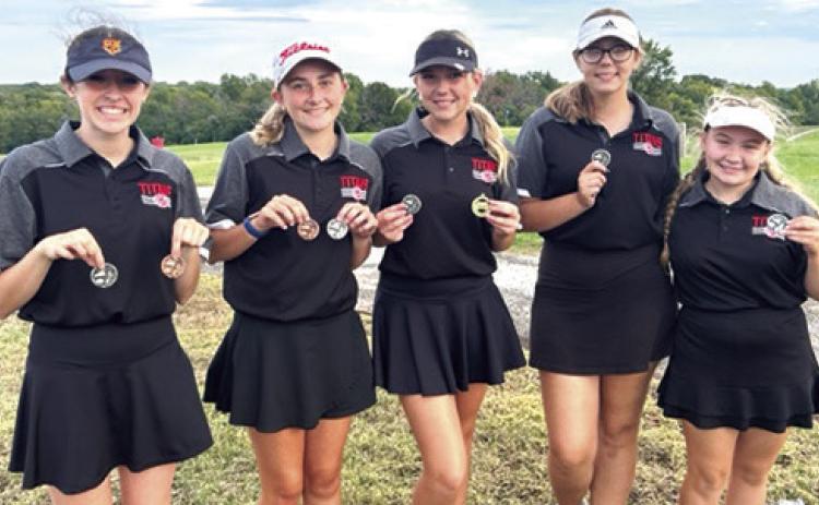 The Lady Titan Golf Team wrapped up their regular season at the Baxter Springs Invitational, Tuesday, taking second in the team standings behind St. Mary’s-Colgan. Lady Titan Junior, Mallory Thompson, placed fourth and freshman, Natalie Wary, placed sixth to finish in the top ten individually. Team members are Natalie Wary, Mallory Thompson, Reese Grundy, Anna Head, and Amory Neely. Courtesy Photo.