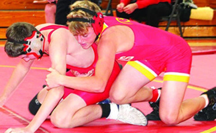 Jr. High Titan wrestling splits home double duels