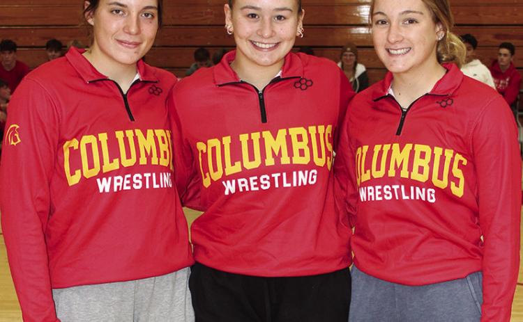 Senior members of the Lady Titan Wrestling Team were introduced during the Meet the Titans Night at the Columbus Unified High School Gymnasium, November 28. Aubree Saporito, Jailyn Rodriguez, and Addison Saporito.