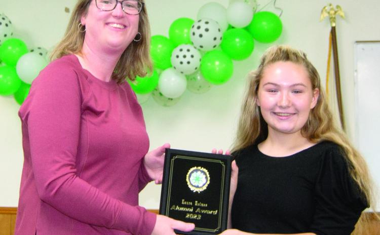 The 4-H award is given to a person that belonged to 4-H as a youth and continues to support 4-H today. That award this year went to Laura Holmes. She has helped at every club activity and encourages all the kids to participate. She is taking new responsibilities as a Club Leader for Spring Valley Sparklers. President Amory Neely presented the