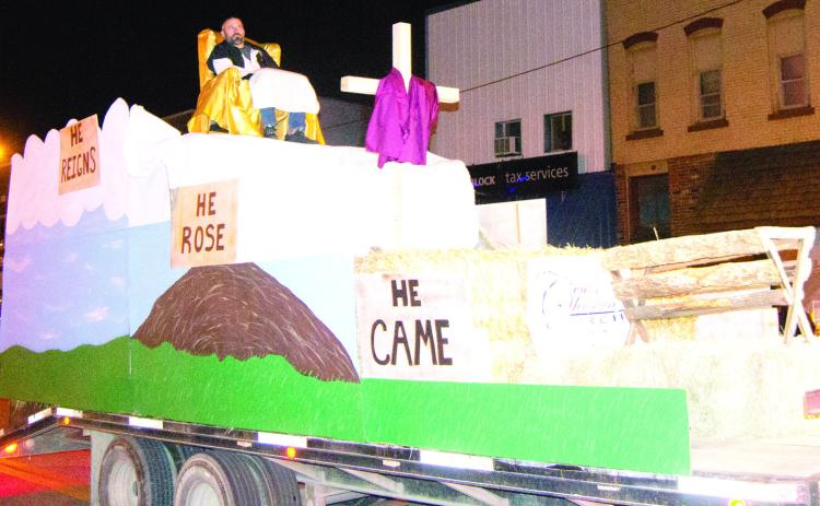 At the annual Columbus Christmas parade the crowd looks forward to the floats. Center Christian Church created this float.