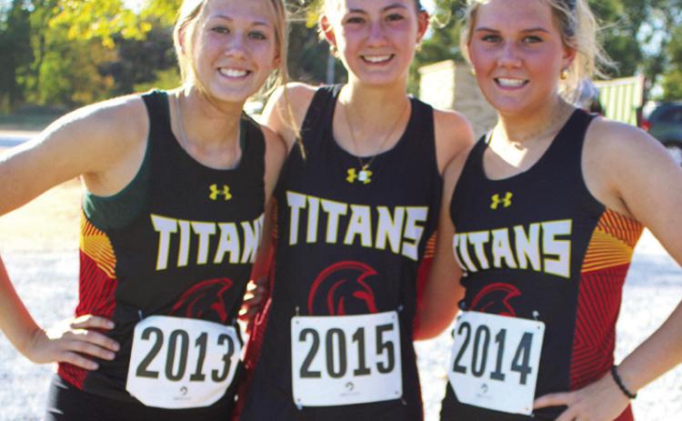 Lady Titans Cara Atlis, sophomore, Darcy Garett, senior, and Kenadie Carter, senior, ran in the CNC League Cross Country Race at the Columbus Brush Creek Golf Course, Thursday.