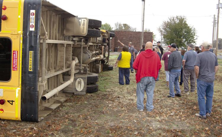 Drivers looked at the underside of the bus where they were told how some of the framework disconnects from the body in an accident