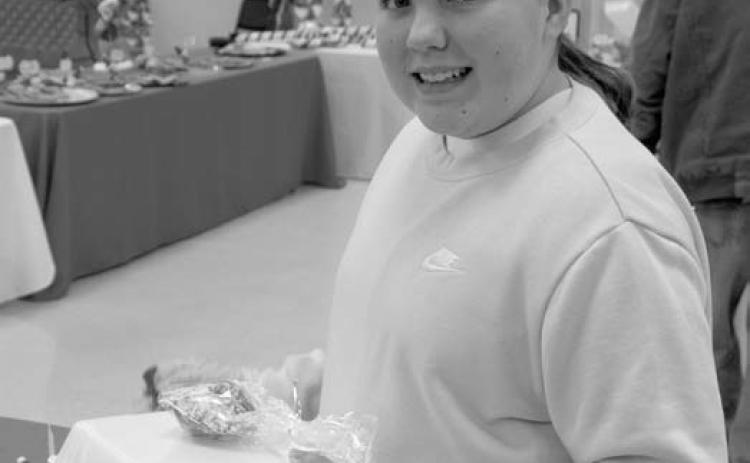 Ally Mussa was choosing her favorite cookies at the annual Cookie Walk held at St. Bridget’s recently. The treats at the sale always sell out quickly.