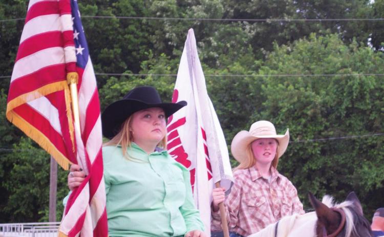 Bulls and barbeque Friday night drew a large crowd to the Columbus Saddle Club Rodeo Grounds