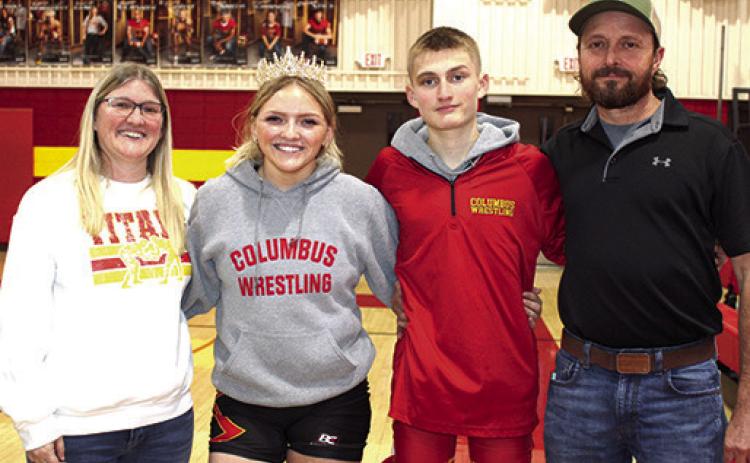Lady Titan Senior, Emily Britt, was recognized during Senior Night Ceremonies at the dual with Labette County, Monday. Emily wrestles in the 140 weight class and earned a win over her LCHS opponent. Her parents, Kim and Carl Britt and fellow Titan Wrestler and brother, Carlson Britt, freshman, were on hand for the final home matches of the seasons.