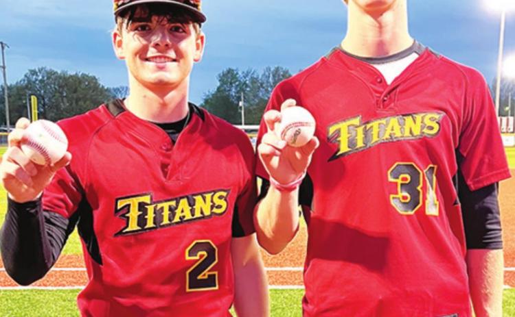 Titans first loss is split at Girard