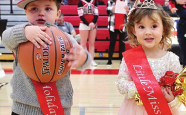Little Mr. and Miss Holiday contest returned to Baxter Springs this Christmas. Elijah Fidler was named Little Mr. Holiday and Little Miss Holiday went to Layla Fry. Their awards were presented during the halftime performance at the Baxter Springs High School Boys Basketball game Friday night. Both of this year’s winners are three years old. Elijah Fidler was the Top Seller, selling over 800 tickets. Photo by Dee Riley.
