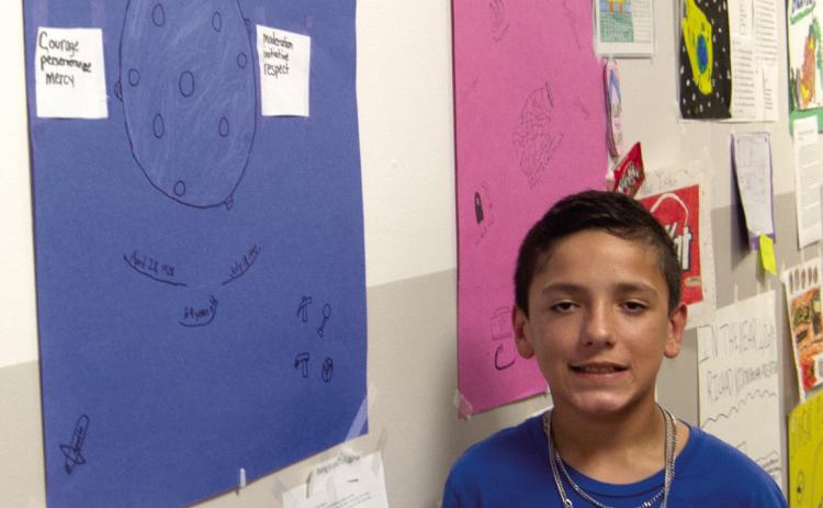 The art work of Lucas Haviland and the other students was displayed on the Junior High School walls during the Compass Academy Network graduation ceremonies.