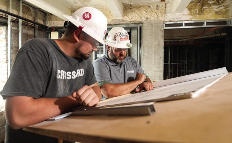 The football players are majoring in Construction Management at Pittsburg State University, and this summer they’re interns for Crossland Construction the contractor for the Hotel Besse project. Courtesy photo.