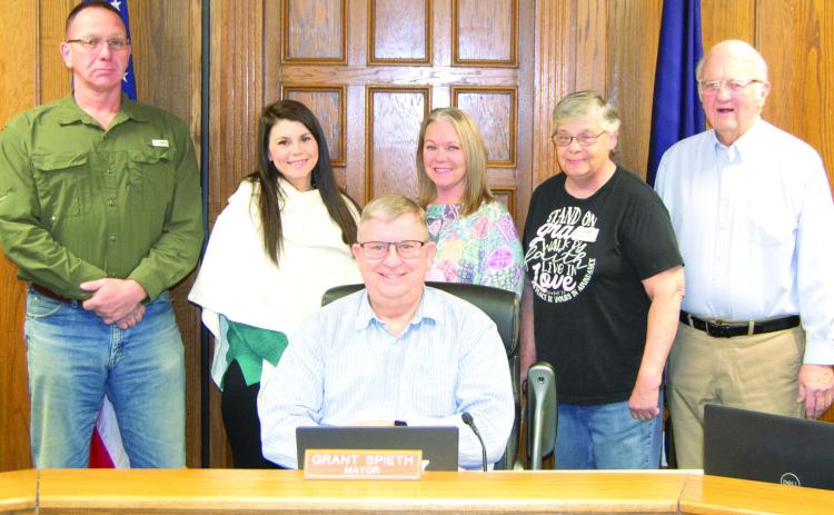 The first meeting of the year, called for new council members to be installed and the other members to be given new assignments. The five members of the council are Wally Sanders, Lindsay Shoemaker, Laura Epler, Kathy Doherty and Tom Pryor. They are standing behind Mayor Grant Spieth.