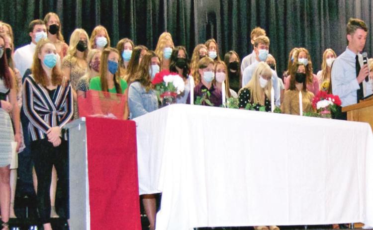 Members of the Baxter Springs National Honor Society held an induction ceremony recently in the Baxter Springs High School auditorium. Photo by Dee Riley.