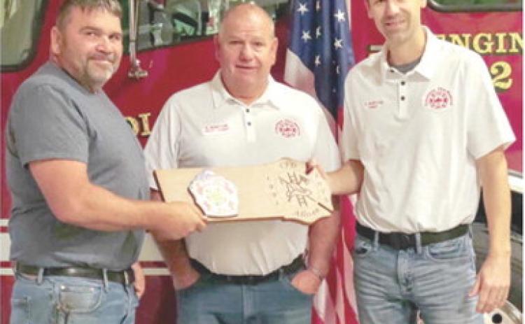 Jason Allison, faithfully served the Columbus Fire Department for 33 years. Jason stepped down earlier this year. He was presented with a plaque to show the department’s appreciation for his decades of dedication and service. Assistant Chief Steve Burton and Chief Steven Burton presented the plaque. Photo courtesy Columbus Fire Department.