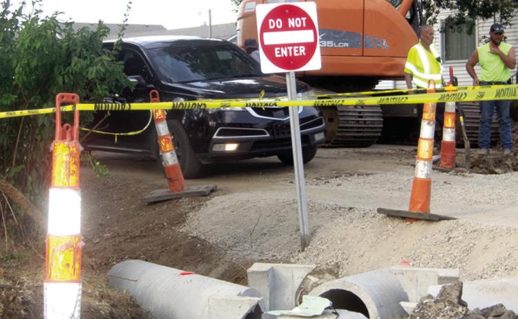 Columbus City public works crews while preparing for the Safe Route School sidewalk reconstruction project found it necessary to replace storm sewer pipes. The current project is near the corner of Vermont Street and Country Road. Three large pipes converge at the corner and carry the storm water to Brush Creek. All of the pipes from the corner to the creek will be replaced.