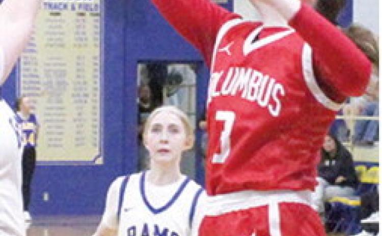 Lady Titan Senior, Katelyn Draeger, snagged a rebound late in the game from the Lady Rams the Columbus loss at Riverton, 20-49, December 19. Lady Ram Junior, Chloe Green, watches from the free throw line.
