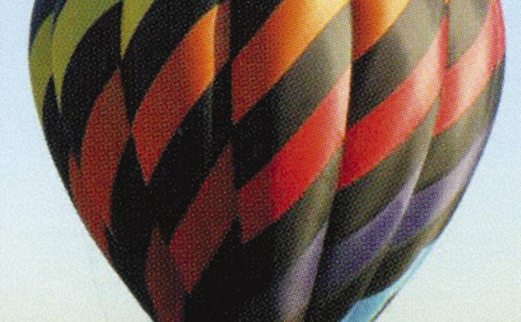 Weather permitting, one of the balloons scheduled to lift off during the Columbus Days Festival is Breaking Dawn. Piloted by Lori Hutchinson of Bonner Springs, Breaking Dawn is sponsored by Mercy Hospital Columbus.