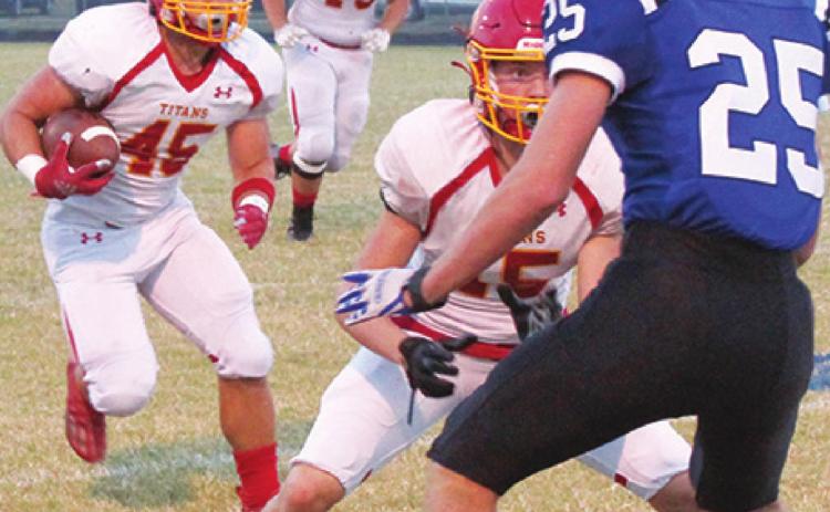 Titans halt Chargers in district win
