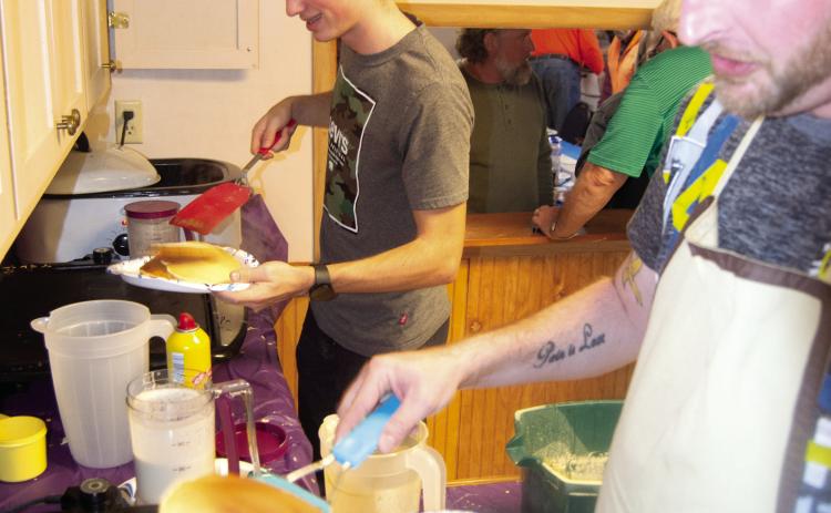 Eli Burkhart and Zach Garner were the grill jockeys at the Neutral Church pancake and sausage dinner. The large crowd kept the grills going until closing time.