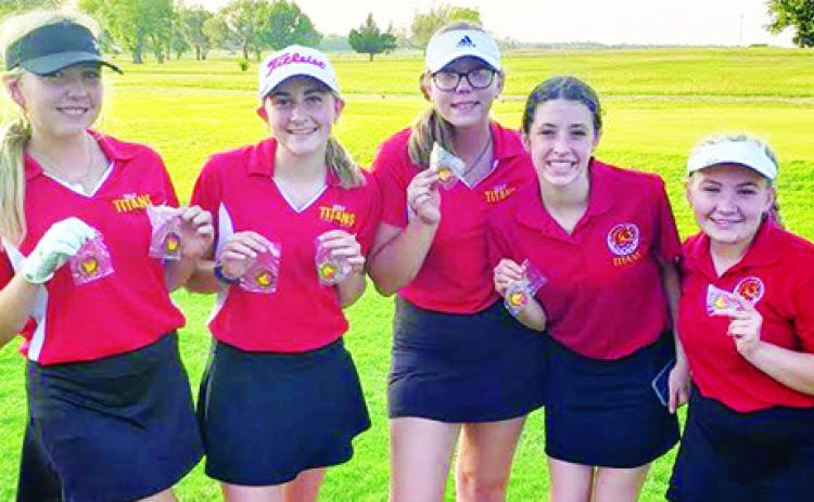 The Lady Titan Varsity Golf Team opened their season on the Oswego Golf Course for the Labette County High School Tournament, Tuesday. The Columbus Team placed third after losing a tie breaker to Chanute. Lady Titan Senior, Reese Grundy, placed second and junior, Mallory Thompson, took top medalist in the SEK League dominate field. Paige Patton, Natalie Wary and Avery Neely, added their scores to the team total.