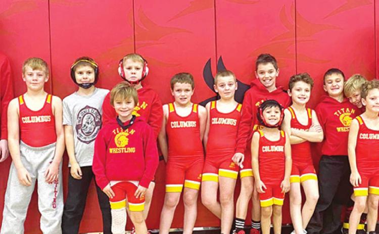 Mini Wrestlers spend holiday on mat