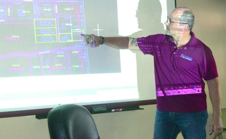 Rod Zinn, PLS, spokesperson for Cornerstone Regional Surveying, LLC told the Commissioners about several boundary problems in the Skidmore area which needs to be addressed. Several of the properties overlap causing problems with future sales.