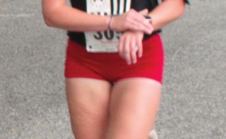Dixie Lacen, finishes second in the race
