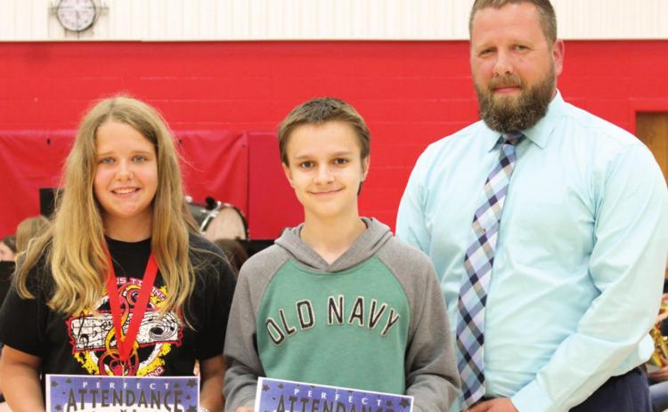 Two students were recognized for perfect attendance