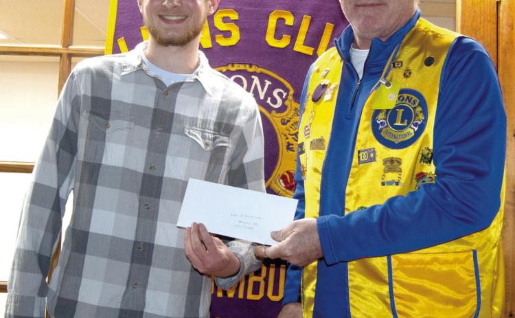 At a recent Lions Club meeting, Cody Ediger was presented with his certificate recognizing him as the January Lion of the Month. Mark Winter, Lions Club president presented Ediger with his certificate.