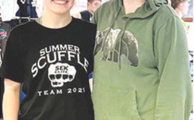 Brooklyn Collingsworth and Adalynn Hutto participated in the Summer Scuffle Dual Tournament at Gardner Egerton High School, over the weekend. Brooklyn had one loss and eight wins and Adalynn had a 3-7 record for the event. Brooklyn also attended the Purler Academy the first week of June and put in 35 hours on the mats. Courtesy photo.