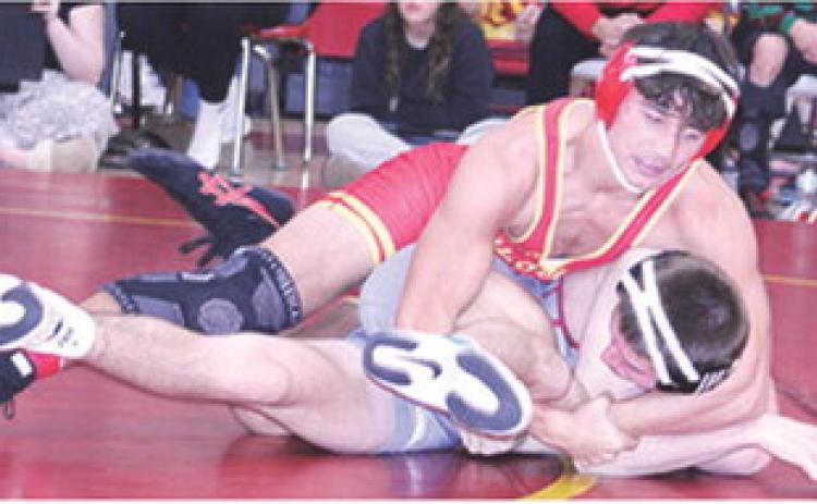 Titan Senior, Jayden Rodriguez, right, takes control, of his match, Saturday, in the 2025 Columbus Duals Tournament at the CUHS Gymnasium. Jayden won five matches by fall and one by forfeit to sweep the day and earn a win in the 157 pound weight class.