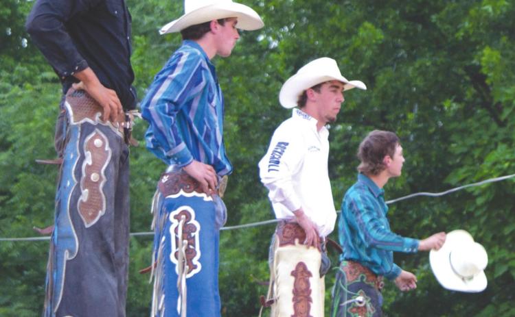 Bull riding, rodeo action at Columbus Saddle Club arena