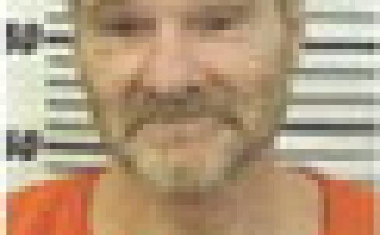 Charles Lawrence “Larry” Amos