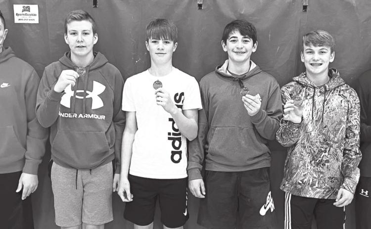 The Central Junior High School Eighth Grade Basketball Team received medals Tuesday morning (above) for earning the distinction of CCCJL Co-Champions for the 2021 regular season. Carter Henry, Kyler Rahmeier, Jace Midgett, Jack Vilela, Syler Schuberger, and Brandon Stice collected their hardware at the Central New Gym. Seth White is not present. Courtesy Photo.