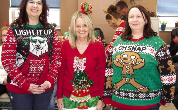 During the Courthouse Christmas Party Ugly Sweater Contest two of the winners were from the County Clerk’s office. Appraiser Delinda White, Michelle Mosler and Cassie Spoonmore.