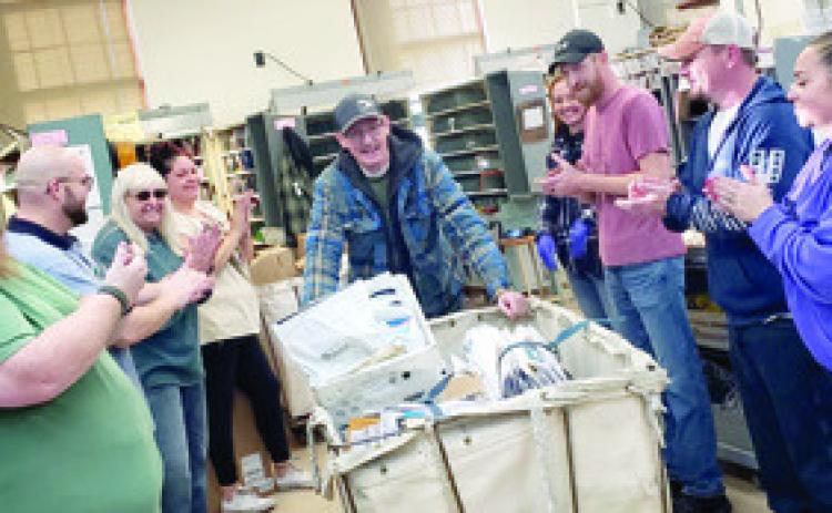 Martin White officially retired from the Postal Service on Sunday