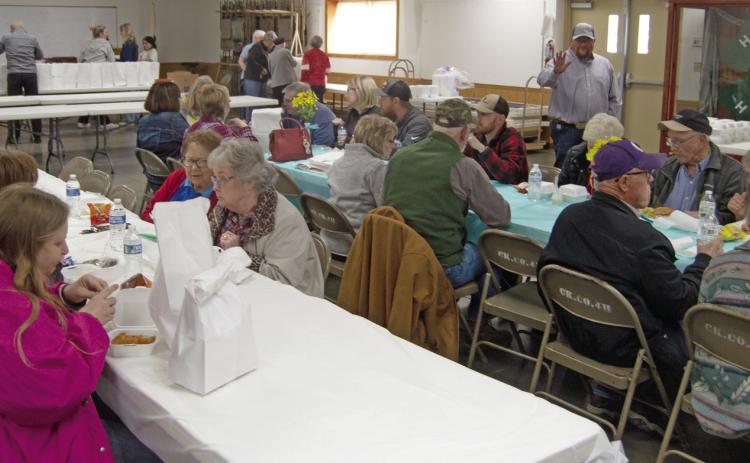 The tables were filled in the 4-H Center as some of the visitors would leave their place was quickly taken by those coming in. Keith and Carla Karsten are well known in the community and there were well over 30 people helping in the project.