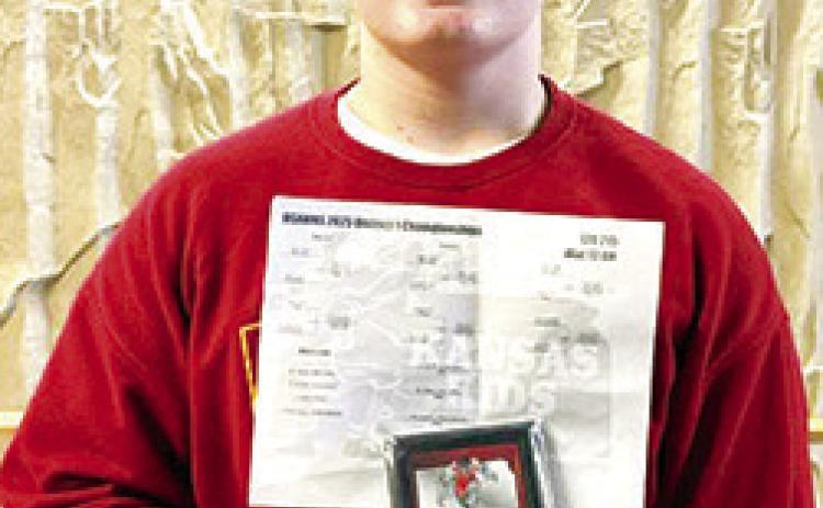 Titan Wrestler Briggs Johnson won the USAWKS 2025 District 1 Championship in the 10U 90 class, Saturday in Lansing. He will be wrestling in the state tournament this weekend in Topeka. Courtesy photo.