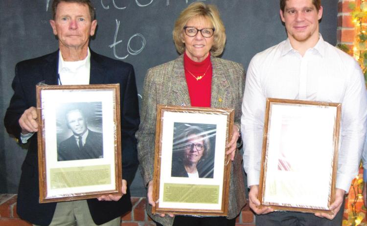 The members of the 2020 Columbus Hall of fame class included Ted Correll, Cheryl Gleason and Cody Moore with their award plaques. Gleason has been a major part of the KSHSAA for 32 years and will be retiring July 1.