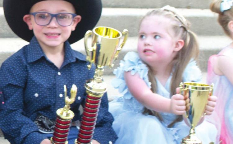The child chosen to be the 2022 Little Mr. and Miss Columbus will receive a motorized vehicle and will ride in the parade.