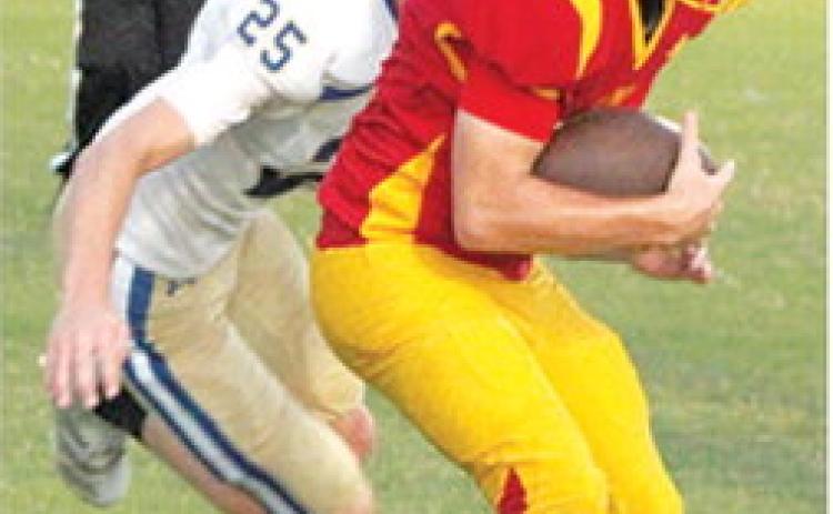 Evan Walters, Titan Freshman, makes the catch from freshman quarterback, Blaze Bowman, just inside the goal line for the two-point conversion in the Columbus win, 24-12, over Riverton, Monday at Titan Stadium.