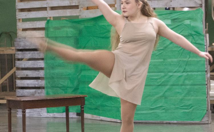 Glittering Stones 4-H Club member Amory Neely presented a interpretive dancing performance at the competitions on Saturday morning. She received a blue ribbon for her efforts and will be performing at the district competition in Chanute.